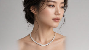 Émerive Emerald Tennis Necklace on brunette model · colourless emerald-cut lab-grown · Maison Alexa