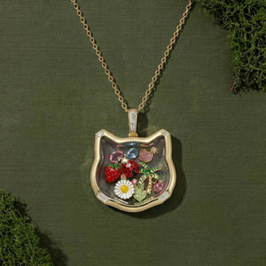 Fox Glass Locket Charm — filled fox locket on green foliage